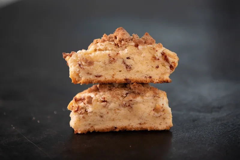 Fruit-filled crumb bars stacked for display