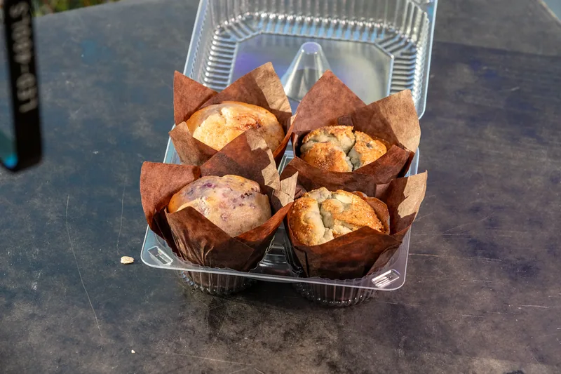 Assorted muffins arranged in paper wrappers