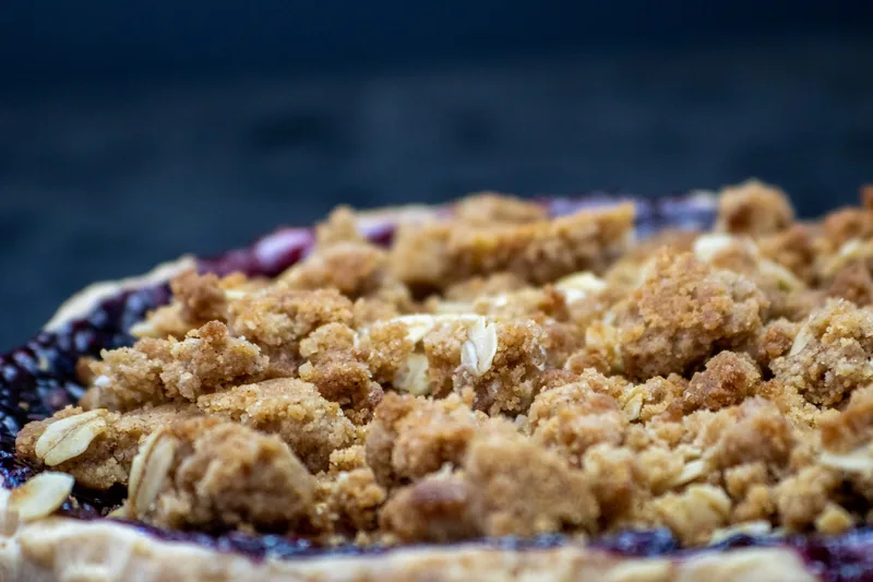 Berry-topped crumble dessert in a baking dish