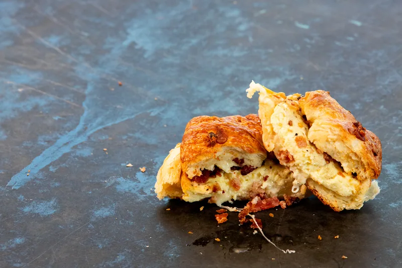 Sliced savory baked item showing its filling