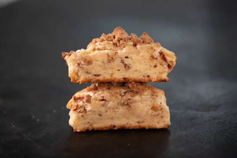 Fruit-filled crumb bars stacked for display