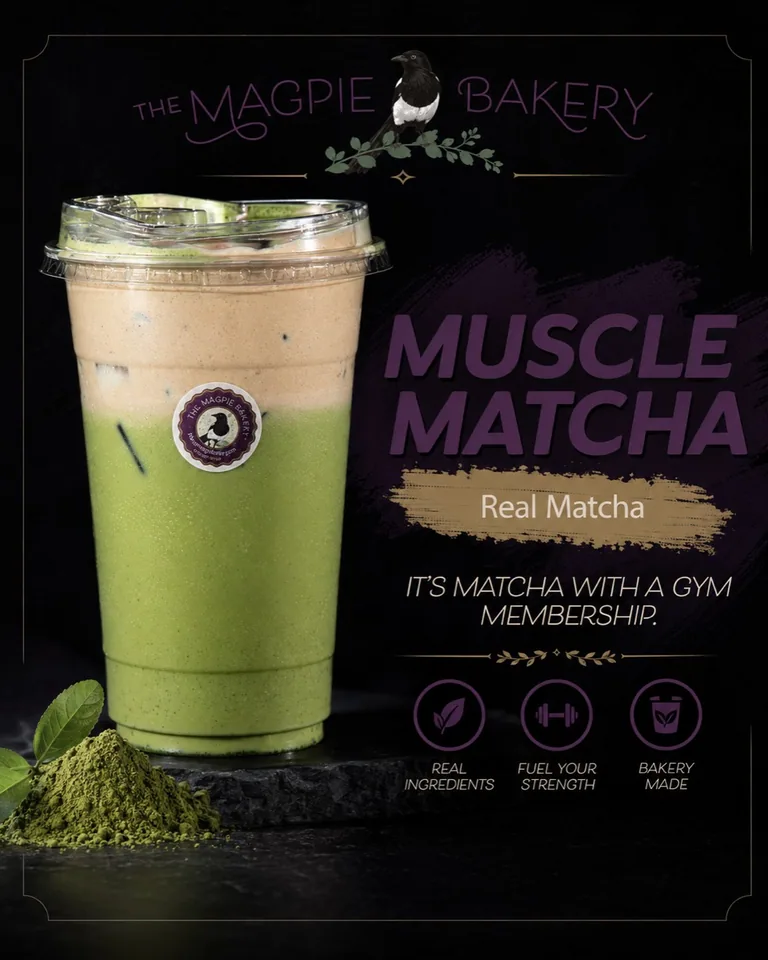 Green layered Muscle Matcha drink in a clear cup